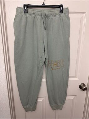 Nike Sage Green Joggers with Gold Logo Embroidery